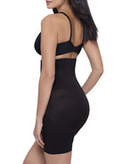 a woman wearing a black high waisted tummy control shaping short back smoothing body shapewear miraclesuit shapewear