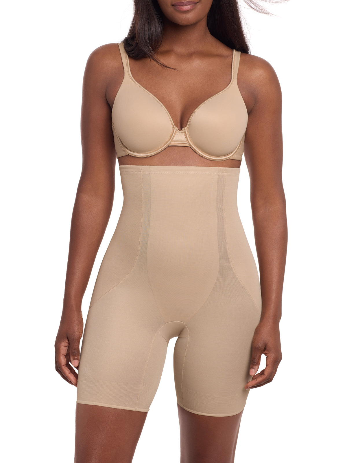 a woman wearing a beige high waisted tummy control shaping short thigh slimmer miraclesuit shapewear