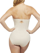 a woman wearing a nude strapless tummy control body shaper shapewear