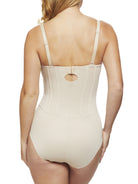 a woman wearing a nude strapless tummy control body shaper shapewear