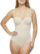 a woman wearing a nude strapless tummy control body shaper shapewear