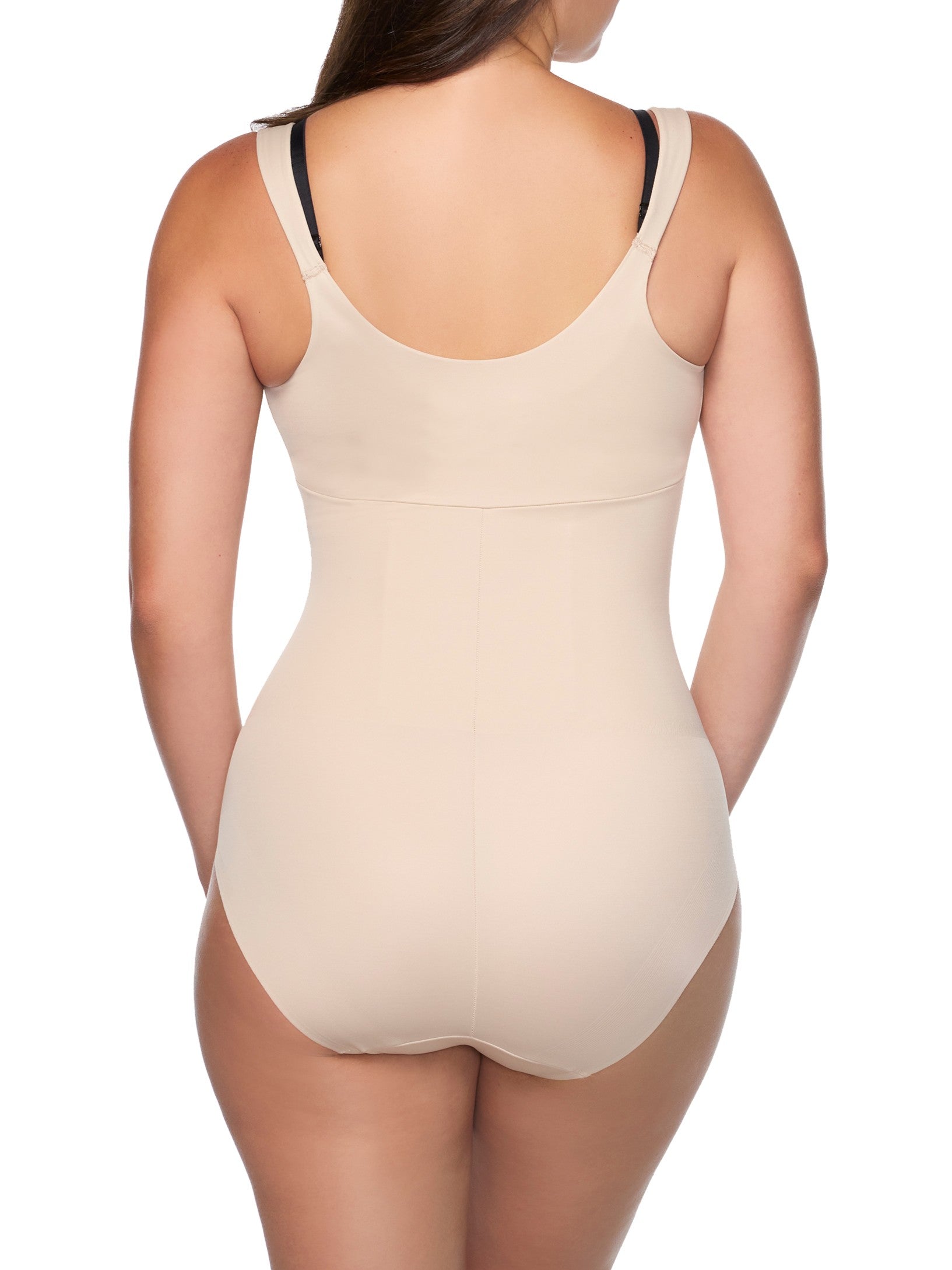 a woman wearing a nude open bust body shaper