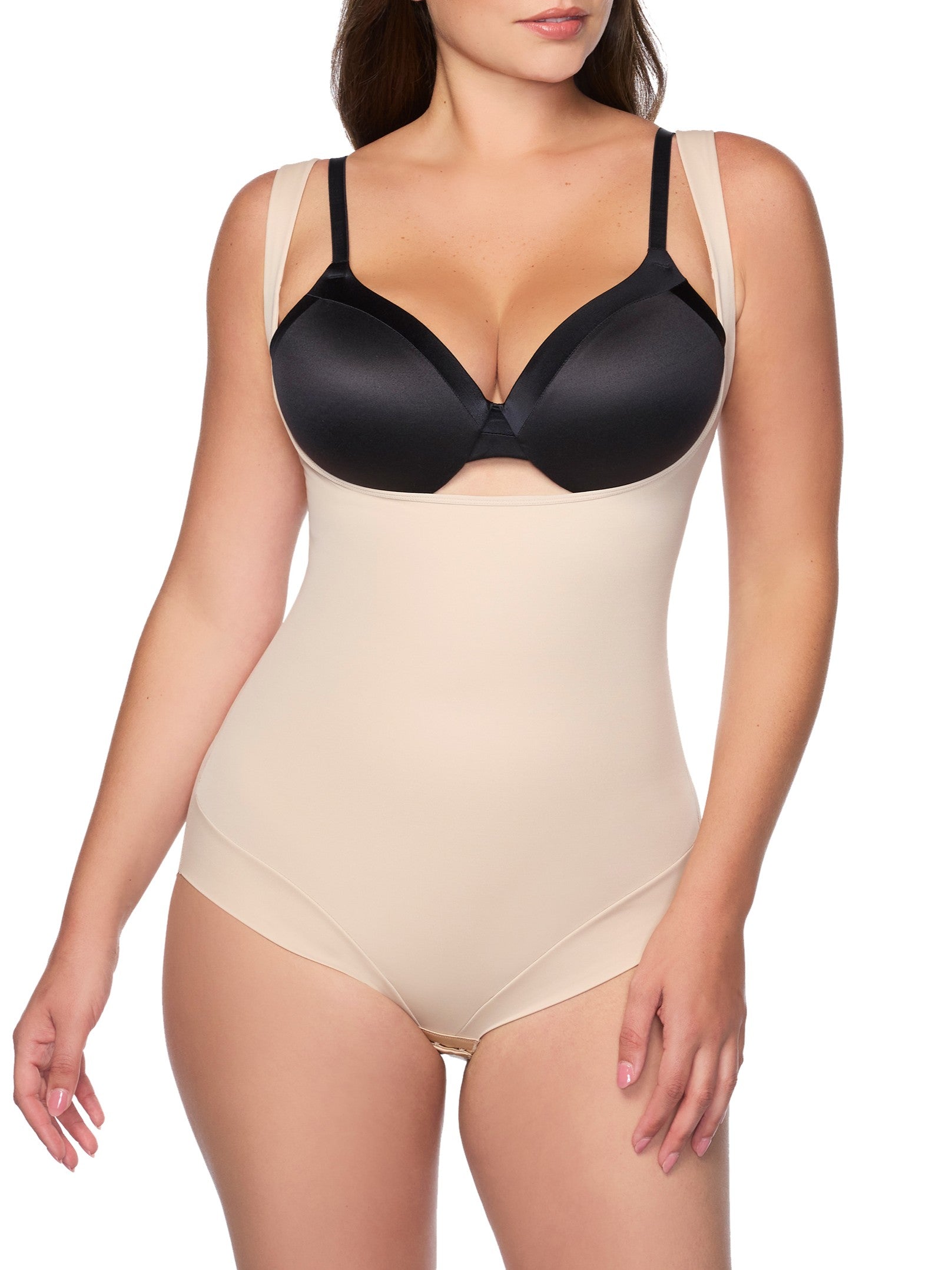 a woman wearing a nude open bust body shaper