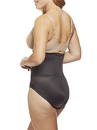 a woman wearing black high waisted tummy control underwear