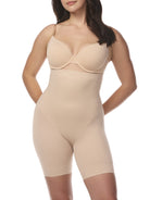 a woman wearing a beige high waisted back smoothing body shaper