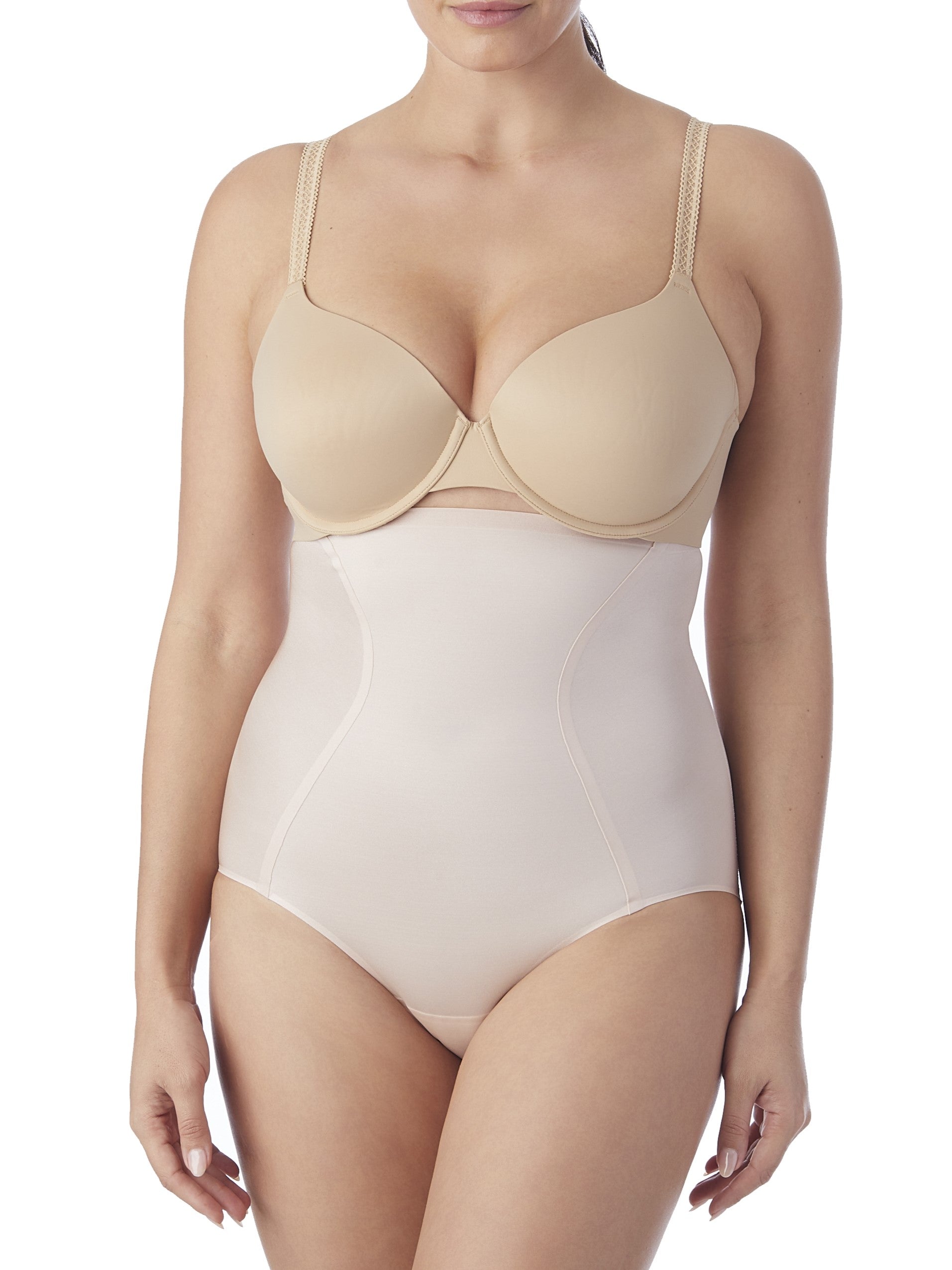 a woman wearing a beige shaping brief