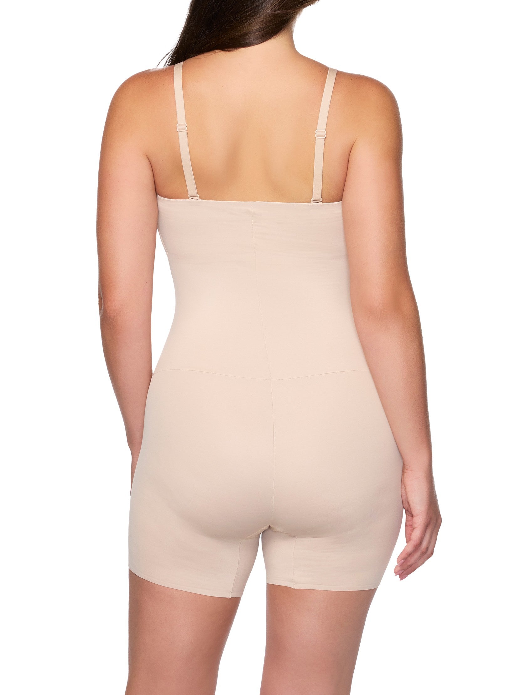 Beige shapewear bodysuit worn by a model on a white background