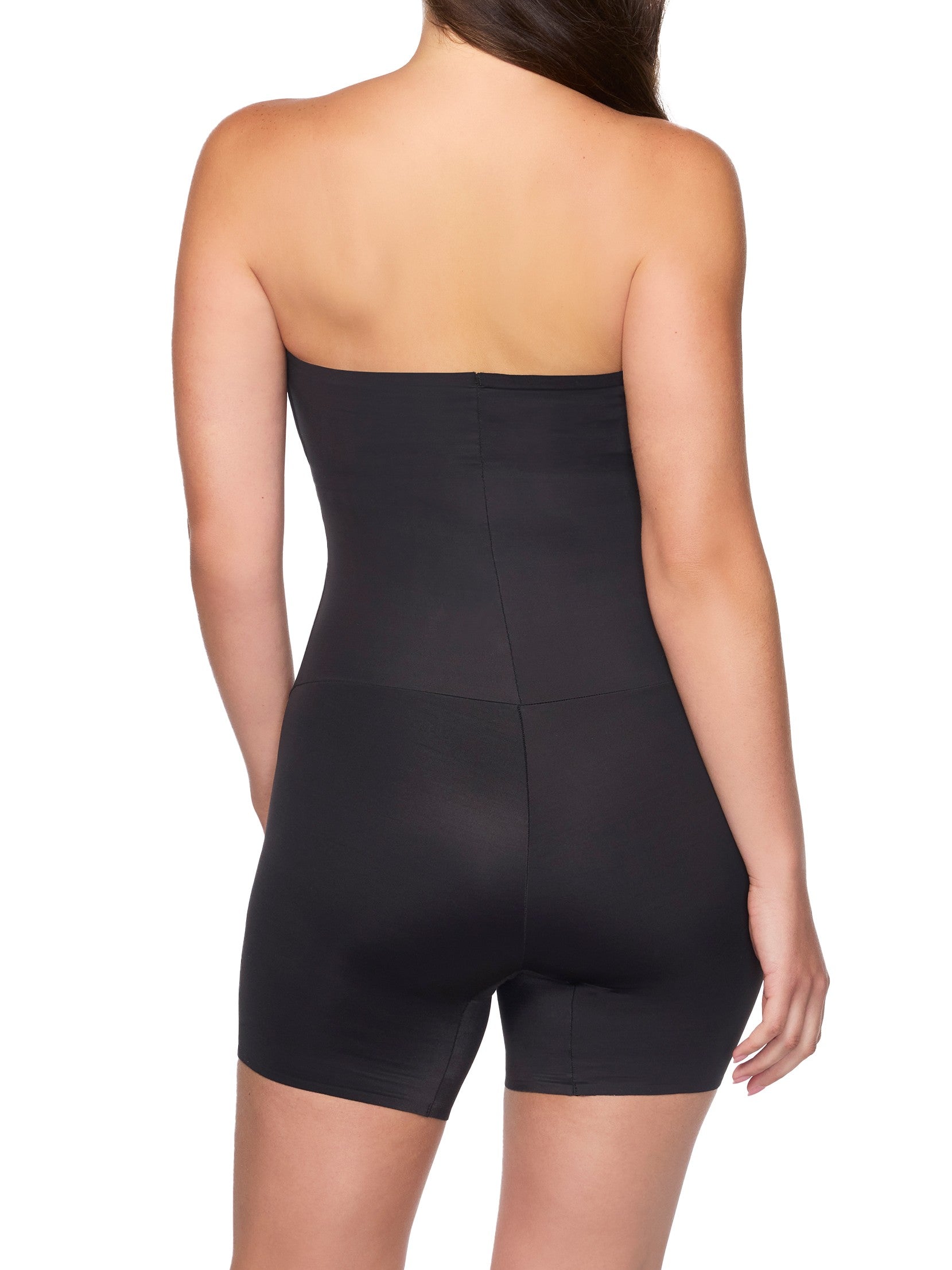 Black strapless dress worn by a model on a white background