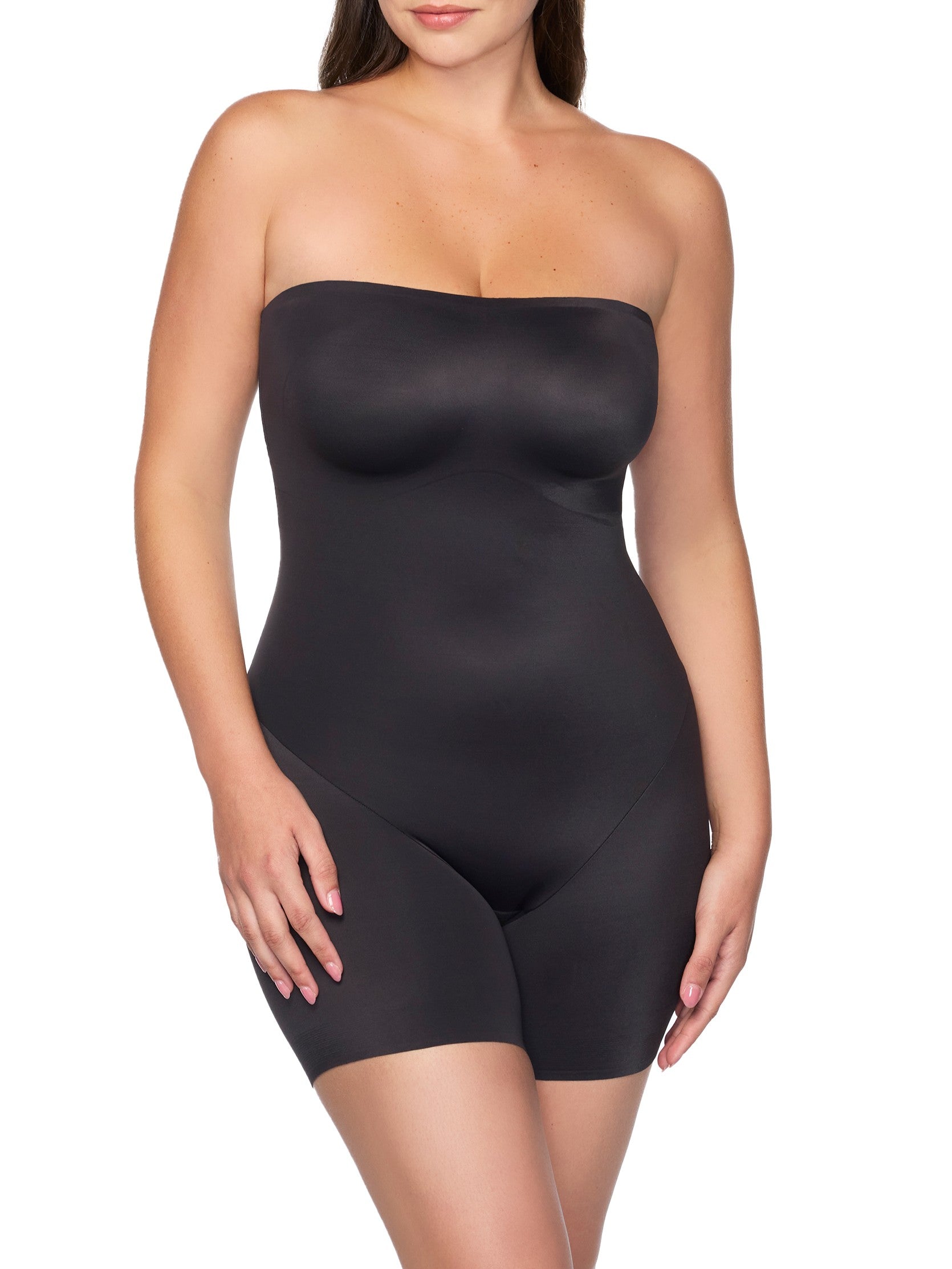 Black strapless bodysuit worn by a model on a white background