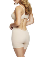 a woman wearing a nude low back shapewear shorts