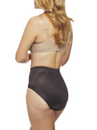 a woman wearing black tummy control underwear shapewear