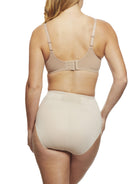 a woman wearing nude tummy control underwear shapewear