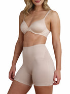 a woman wearing a nude tummy control shapewear short