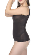 a woman wearing a black shaping camisole shapewear