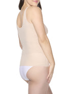 a woman wearing a nude shaping camisole shapewear