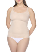 a woman wearing a nude shaping camisole shapewear