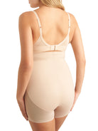 a woman wearing a nude tummy control shapewear short