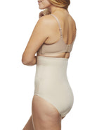 a woman wearing nude high waisted tummy control underwear shapewear