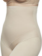 a close-up detail of a woman wearing nude tummy control shapewear shorts