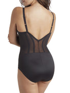 a woman wearing a black tummy control body shaper shapewear bodysuit