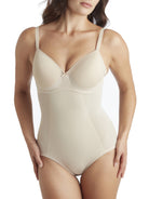 a woman wearing a nude tummy control body shaper shapewear bodysuit