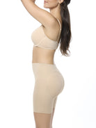 a woman wearing a beige butt pad butt boost booty lift shaping short