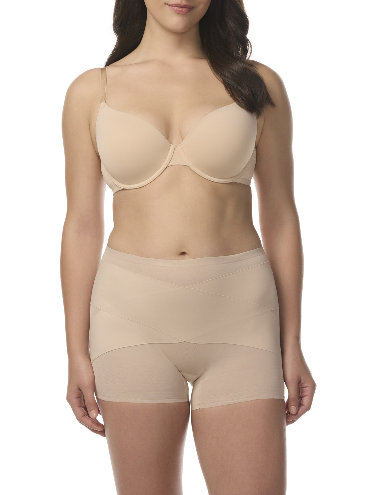 A woman wearing a sheer beige shaping boyshort with shaping panels