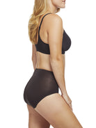 a woman wearing black tummy control underwear shapewear