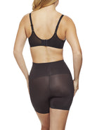 a woman wearing a black tummy control shapewear short