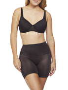 a woman wearing a black tummy control shapewear short