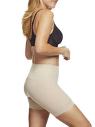 a woman wearing a nude tummy control shapewear short