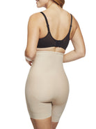 a woman wearing nude high waisted tummy control shapewear shorts