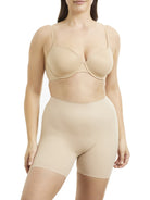 a woman wearing a nude tummy control shapewear short