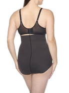 a woman wearing a black high-waist shaping brief