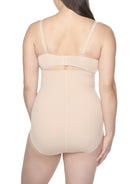 a woman wearing a beige high-waist shaping brief
