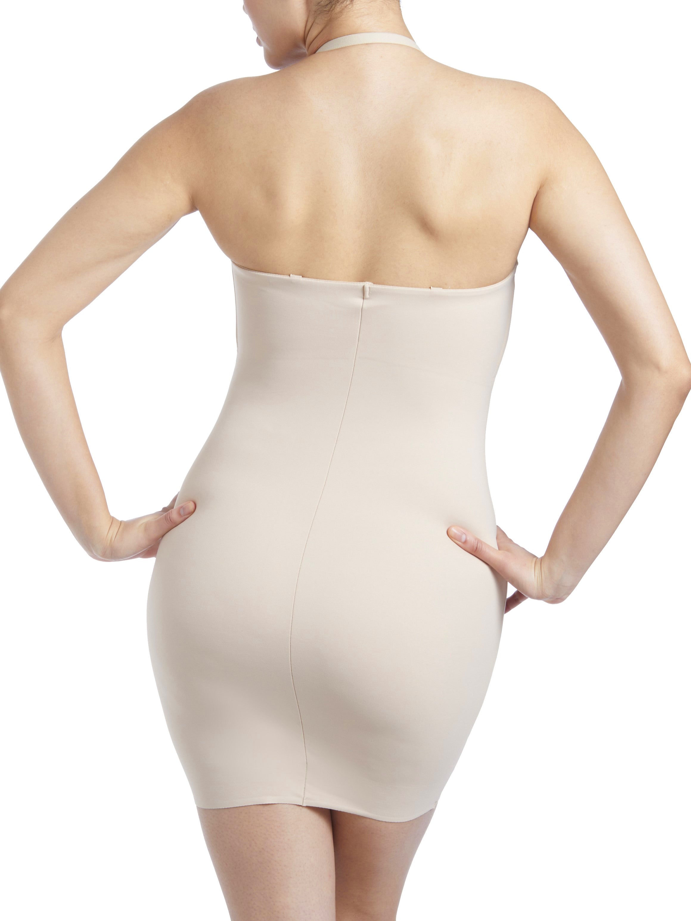 a woman wearing a nude tummy control shaping slip body shaper