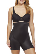 a woman wearing a black high waisted tummy control shapewear short