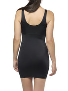 Black slip shapewear worn by a model on a white background