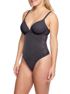 a woman wearing black high waisted tummy control thong underwear shapewear