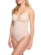 a woman wearing nude high waisted tummy control thong underwear shapewear