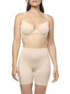 Woman wearing a beige shapewear short