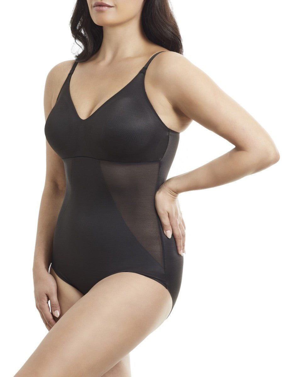 a woman wearing a black tummy control body shaper shapewear