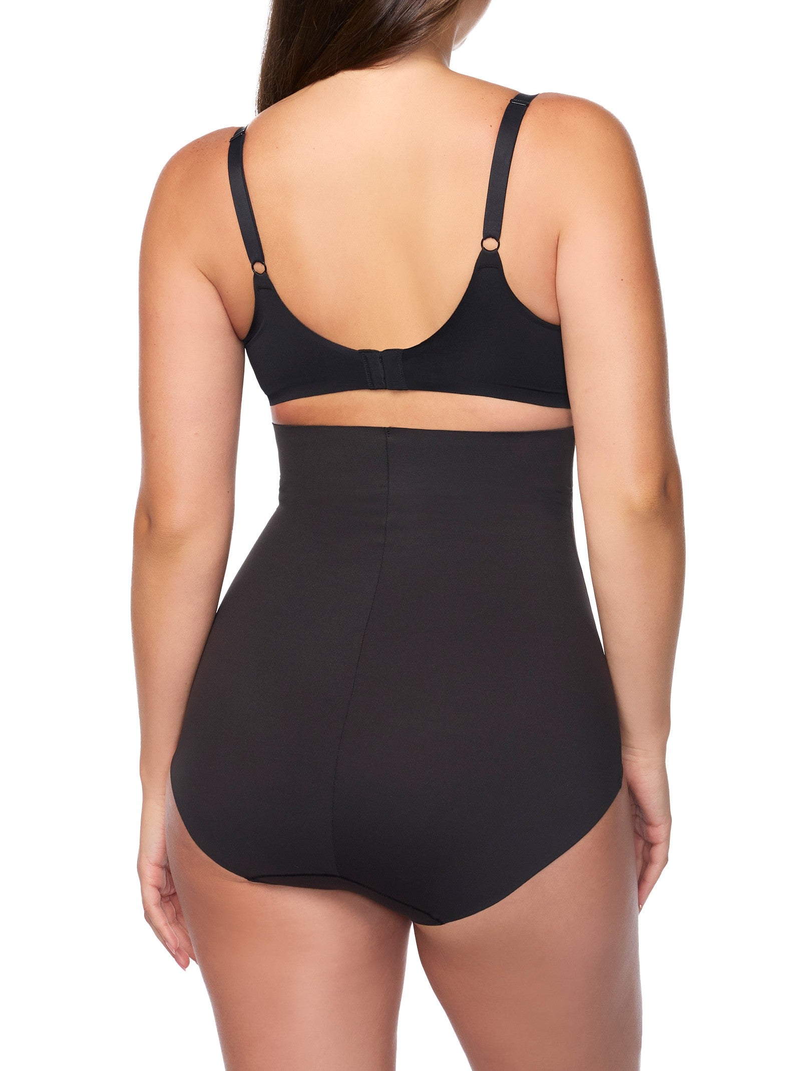 woman wearing a black high-waisted shaping brief 