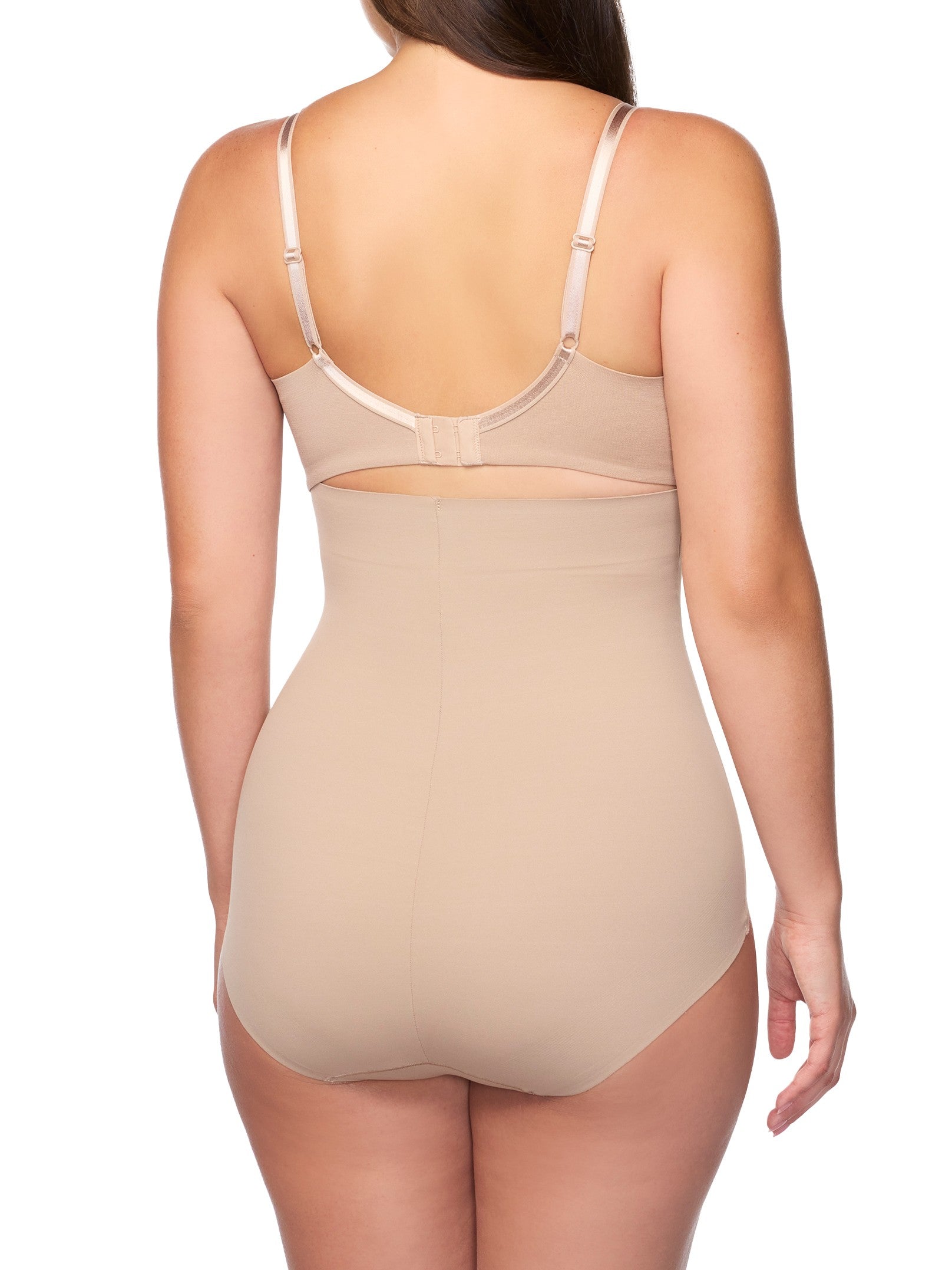woman wearing a beige high-waisted shaping brief 