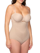 woman wearing a beige high-waisted shaping brief 