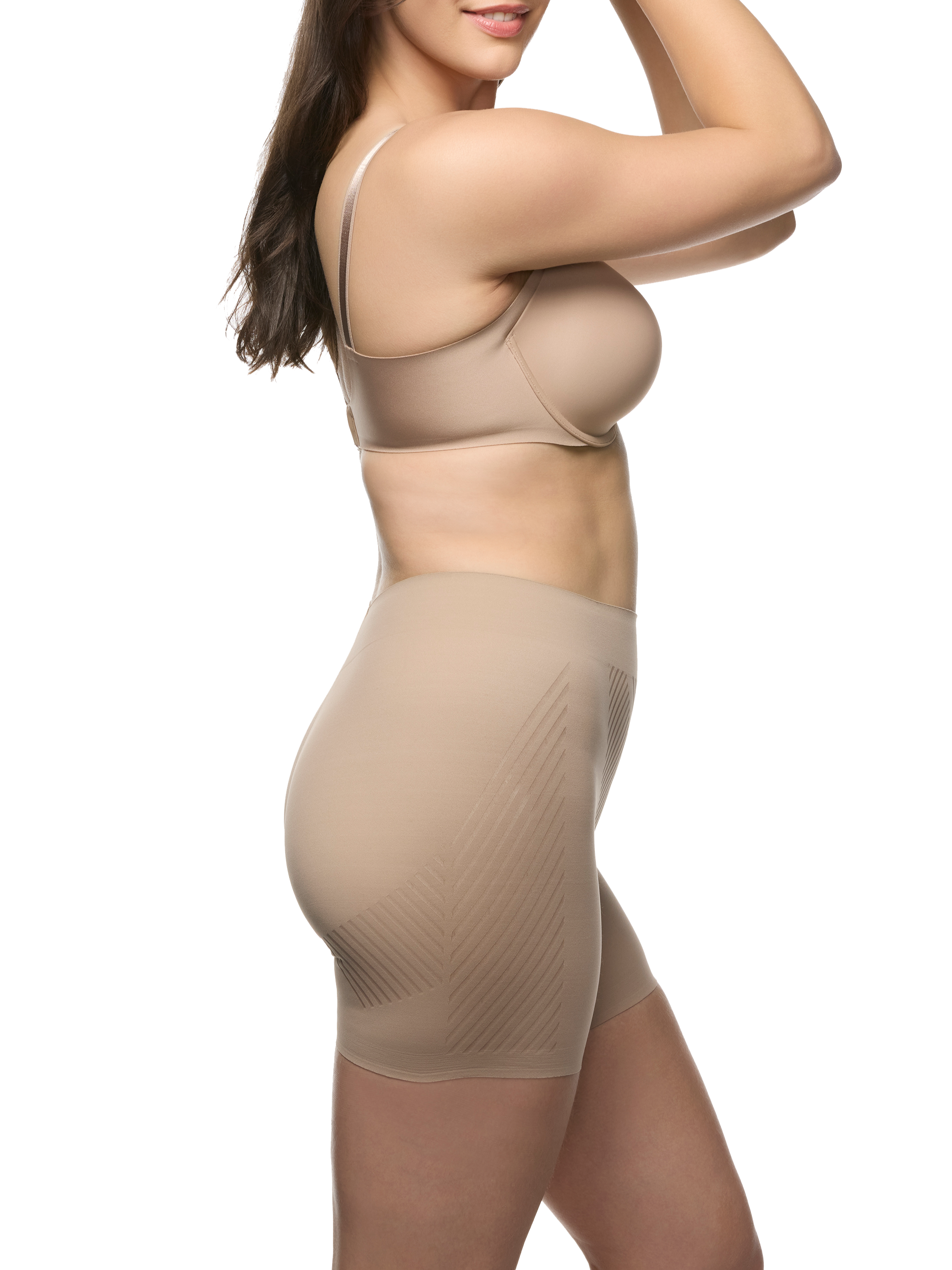 a woman wearing a beige tummy control shapewear short