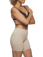 a woman wearing a nude tummy control shapewear short