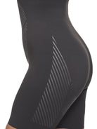 a close-up detail of a woman wearing a black high waisted tummy control shapewear short