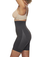 a woman wearing a black high waisted tummy control shapewear short