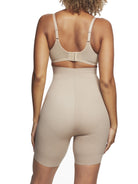 a woman wearing a nude high waisted tummy control shapewear short